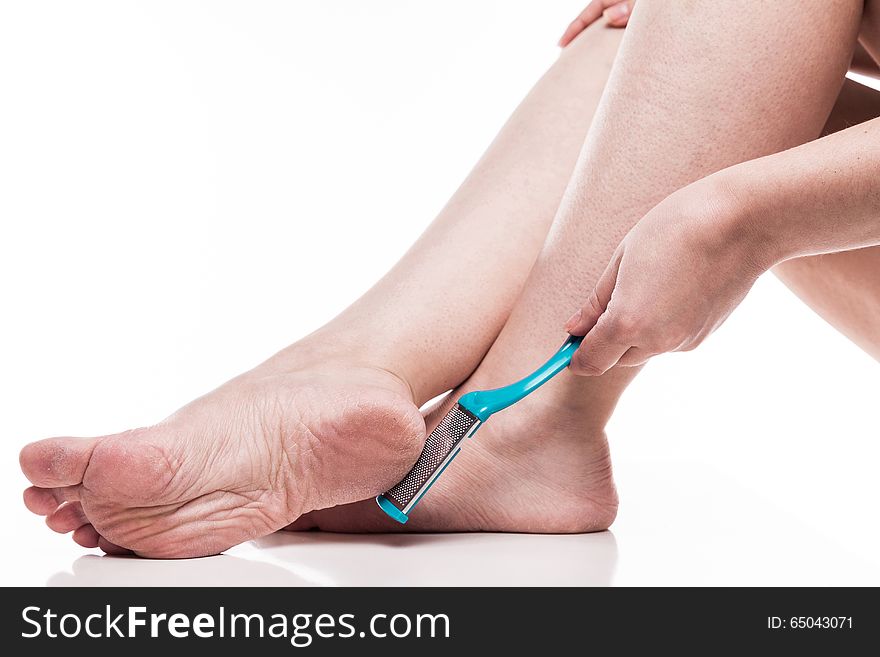 Care for dry skin on the well-groomed feet and heels with the help of tools pedicure graters Foot.