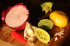 Red Onion, Hot Pepper, Garlic & Avocado Shell Stock Image Red Onion, Hot Pepper, Garlic & Avocado Shell Stock Image