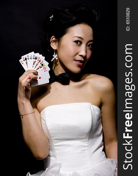 Chinese girl with cards in hand