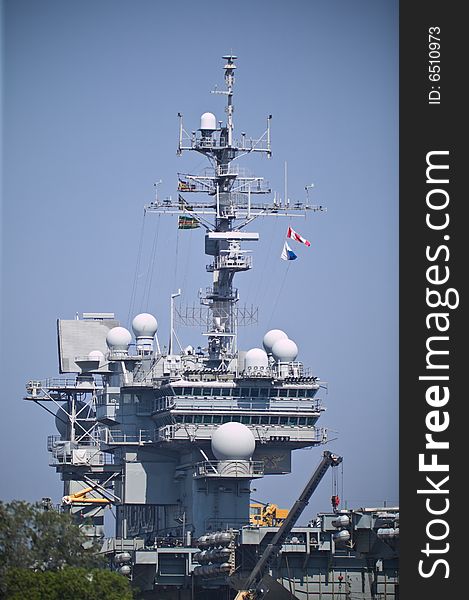 USS Kitty Hawk aircraft carrier docked in San Diego Bay. USS Kitty Hawk aircraft carrier docked in San Diego Bay