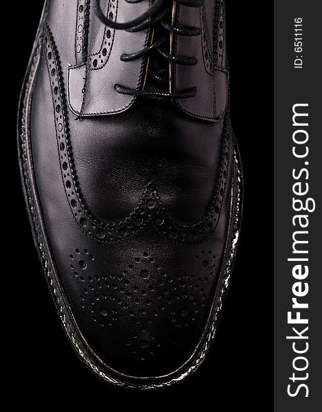 Black Leather Shoe on Black Background