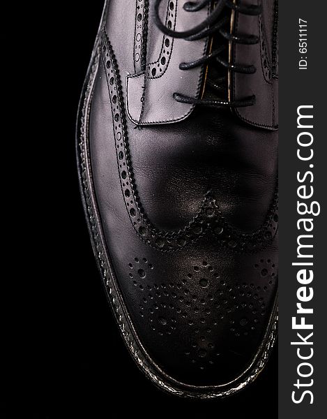 Black Leather Shoe on Black Background