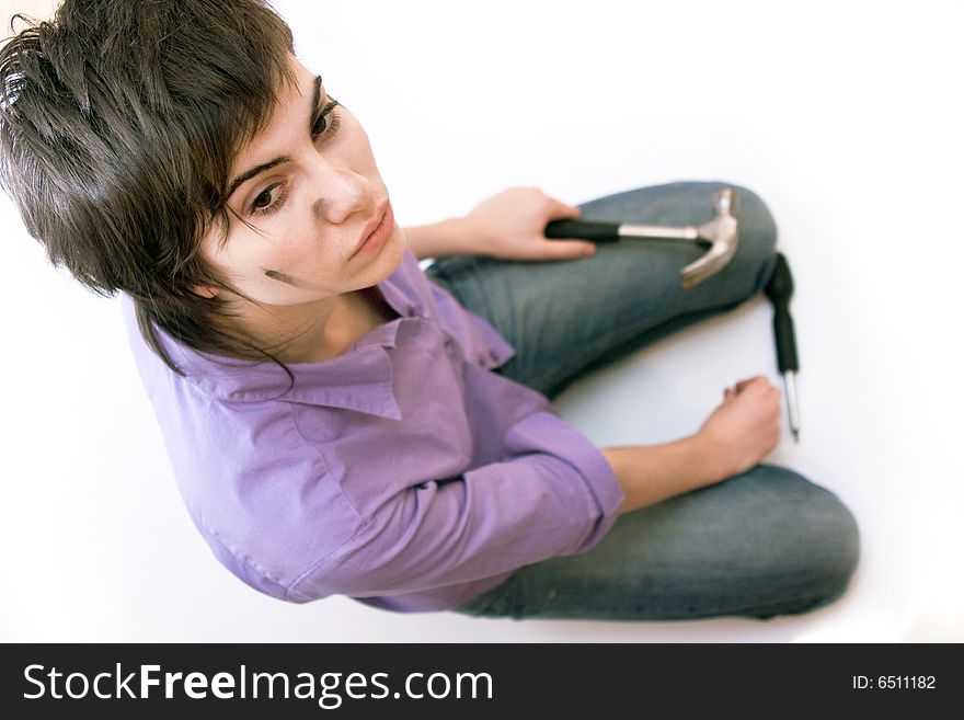 Portrait of a young beautiful woman holding tools. Portrait of a young beautiful woman holding tools