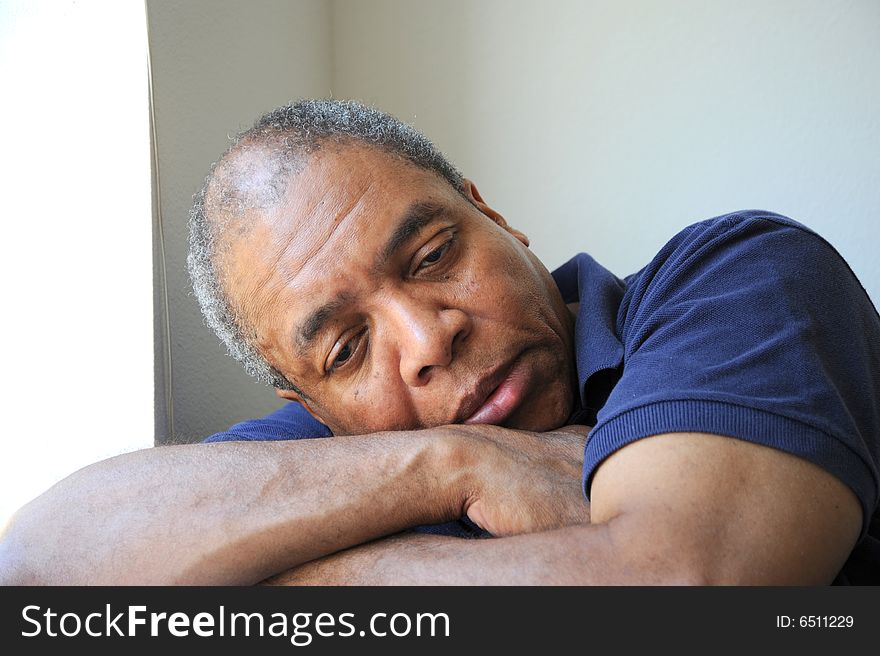 African american man relaxing at home. African american man relaxing at home.