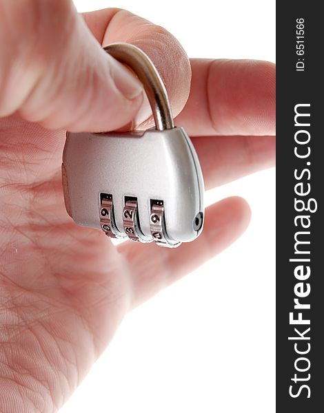 Code lock in hand on a white background