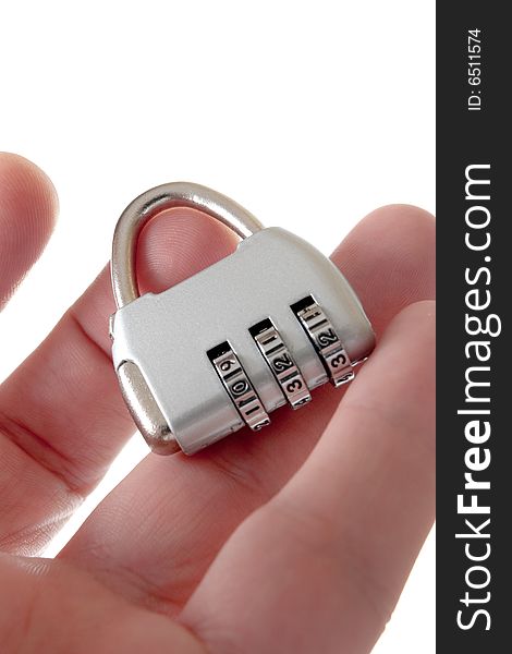 Code lock in hand on a white background