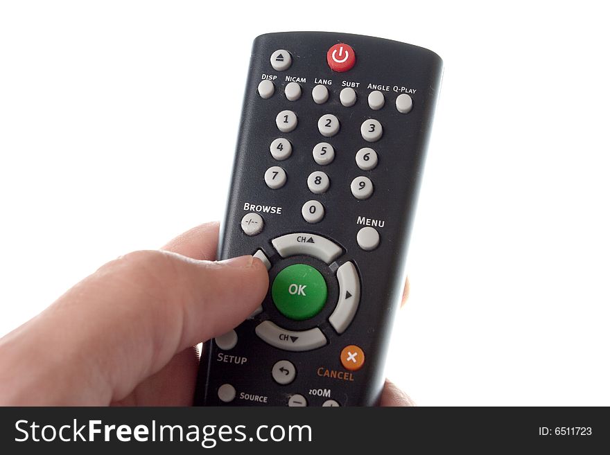 Black Infrared remote control in hand on a white background