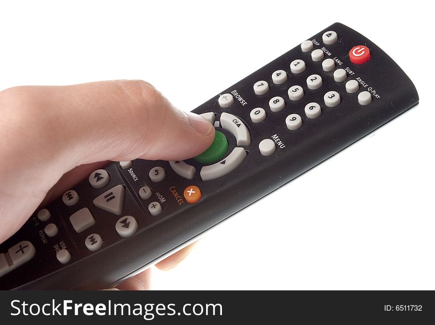 Black Infrared remote control in hand on a white background