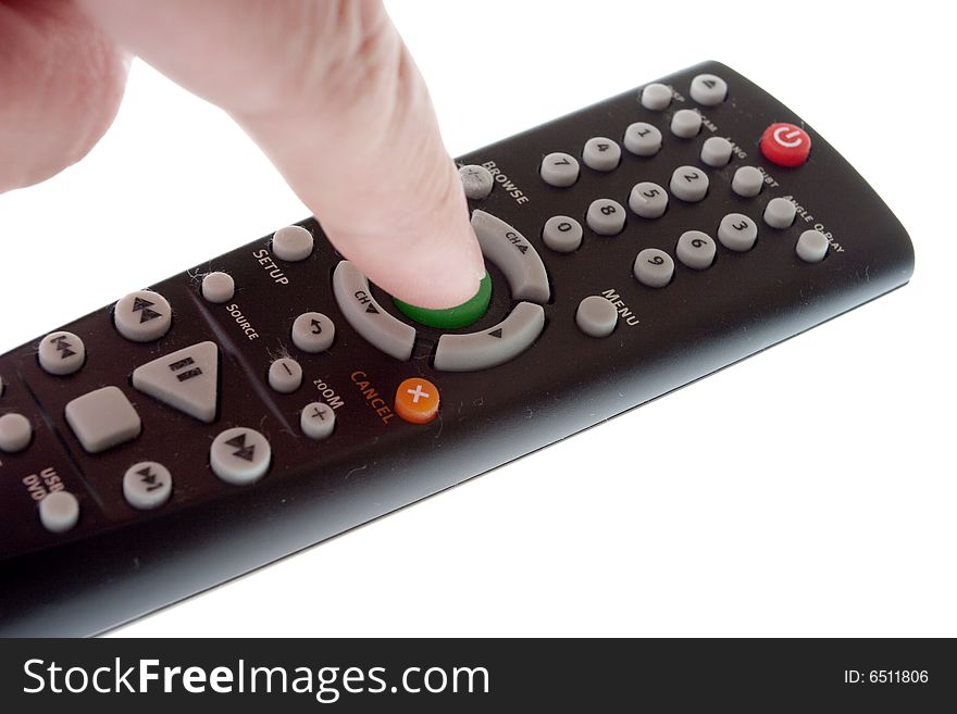 Black Infrared remote control in hand on a white background