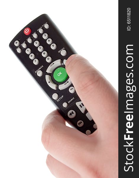 Black Infrared remote control in hand on a white background