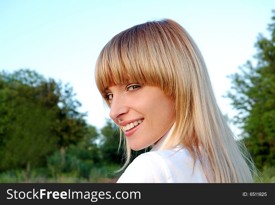 The portrait of beautiful young woman