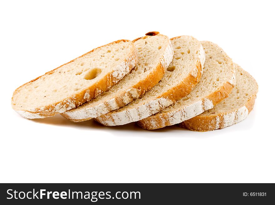 Five slices of white bread on the white background