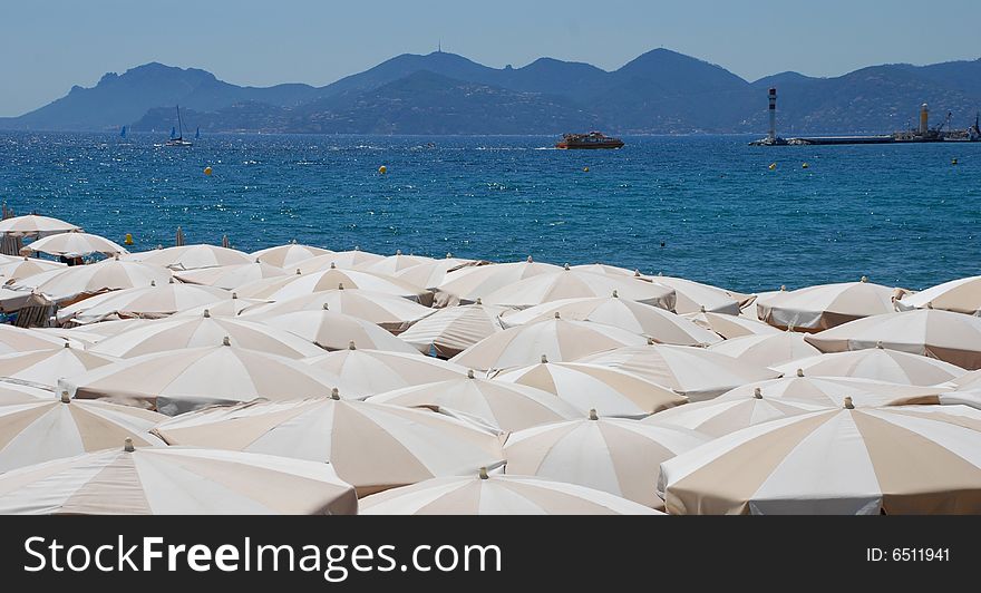 Parasols on the beach in Cannes (Croisette)