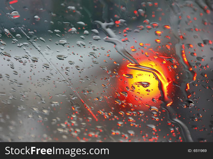 Close-up raindrops on a car window. Close-up raindrops on a car window