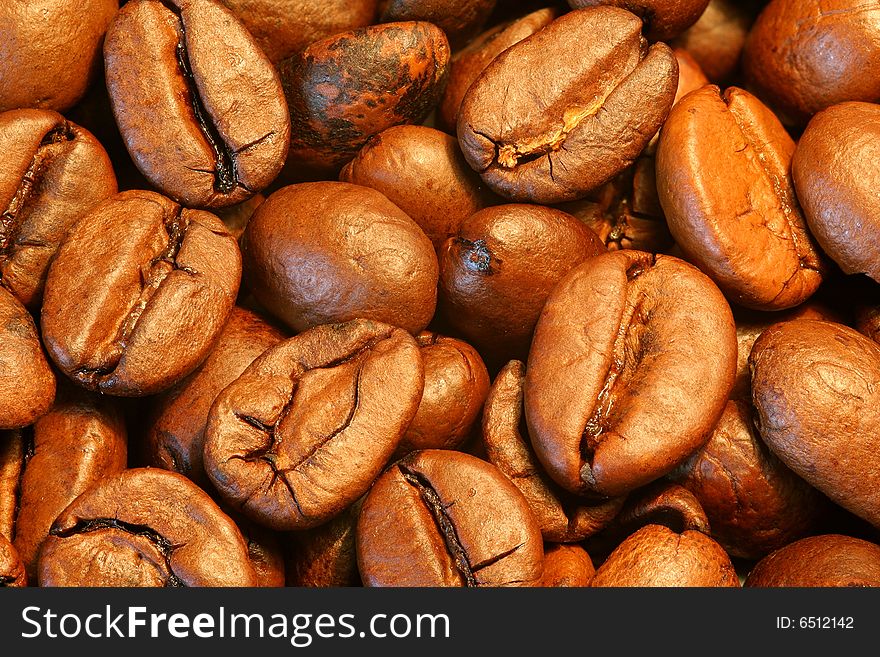 Closeup of brown coffe beans. Closeup of brown coffe beans