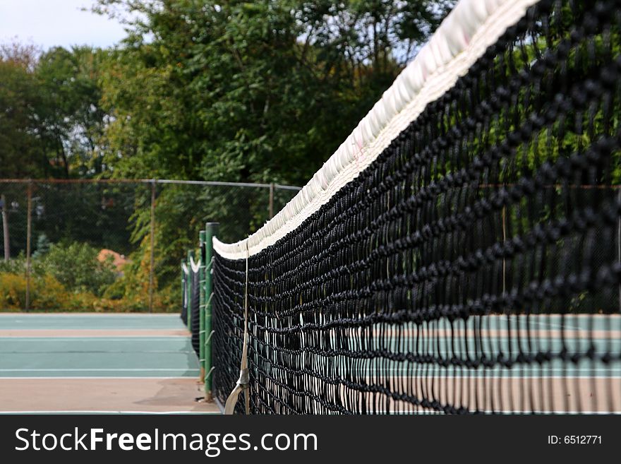 Side view of a tennis court net. Side view of a tennis court net