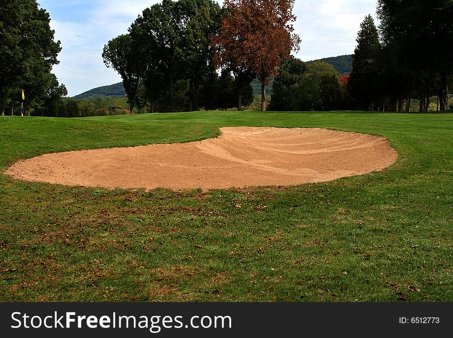 Sand trap on a beautiful golf course