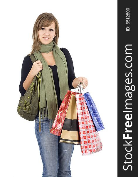 Happy girl holding shopping bags, isolated, on white background