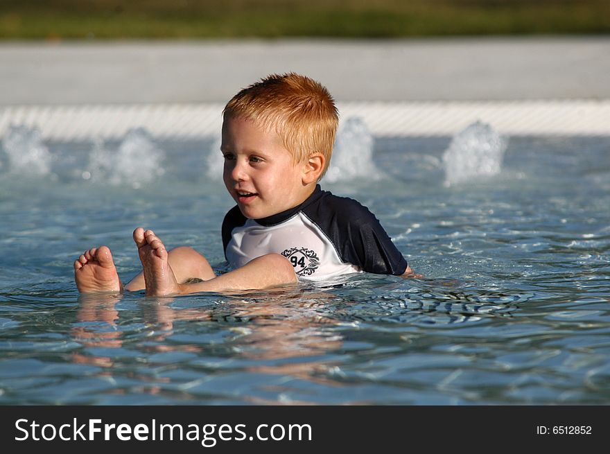 BOY IN POOL