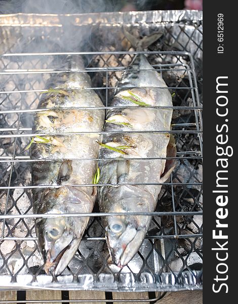 Barbecue grill with stuffed fish