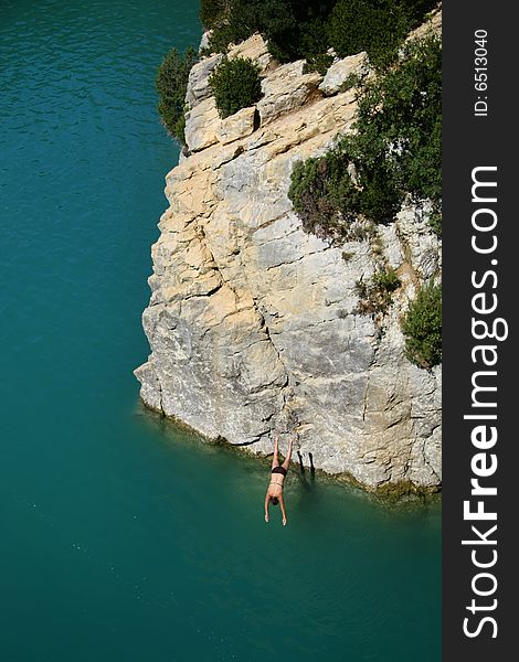 Woman jumps from the rock in Verdon