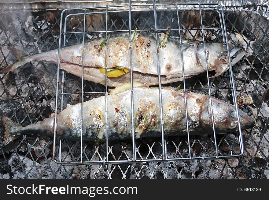 Barbecue grill with stuffed fish