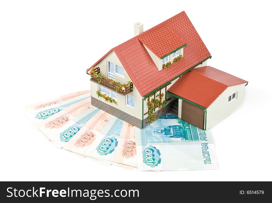 Miniature House and Money. Buying house concept