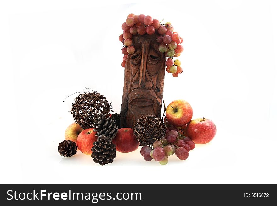 Composition from apples, grapes, heads from a tree. Composition from apples, grapes, heads from a tree