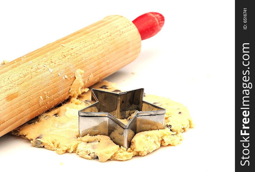 Shot of rolling out chocolate chip cookie mixture. Shot of rolling out chocolate chip cookie mixture