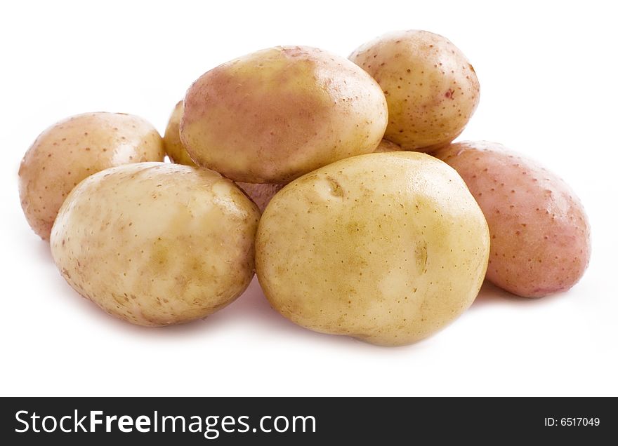 Bunch of potatoes on white background