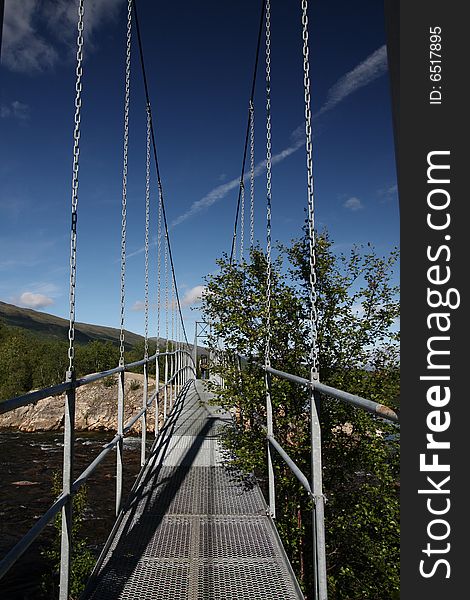 Suspended bridge in a national park, Sweden. Suspended bridge in a national park, Sweden