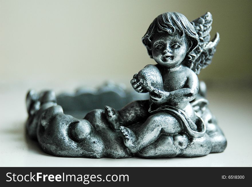 An old silver angel statue