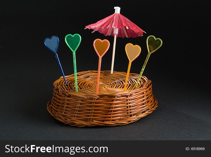 Wum basket with a umbrella and hearts. Wum basket with a umbrella and hearts