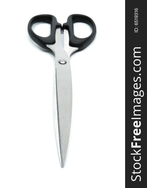 Modern metal scissors on a white background