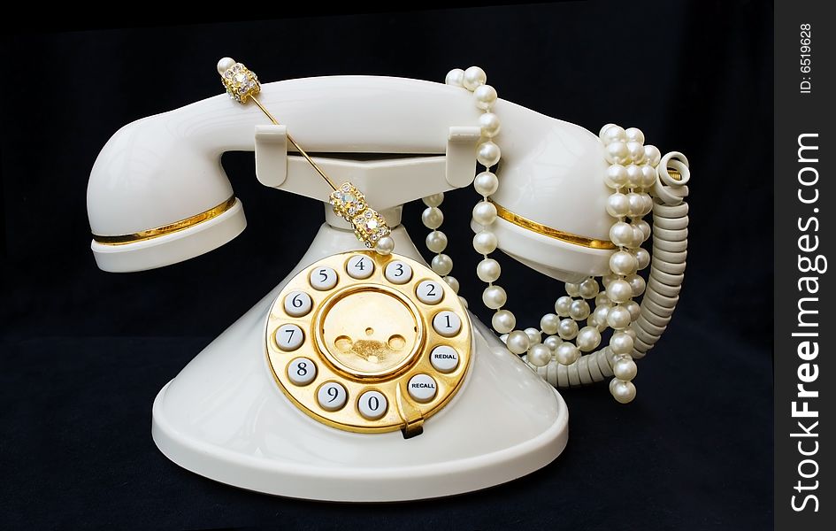 Vintage phone with pearls with clipping path