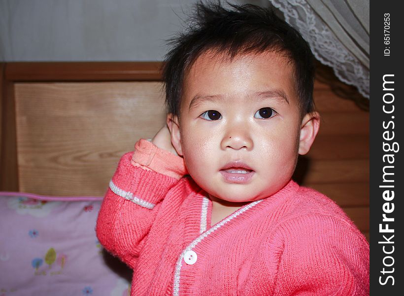 A cute portrait of an Asian baby. A cute portrait of an Asian baby.