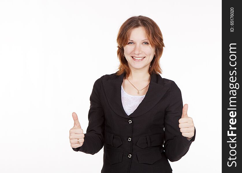 Smiling business woman in black suit showing a gesture all is good. Smiling business woman in black suit showing a gesture all is good