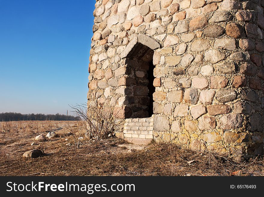 Detail of old watchtower on sunny day closeup