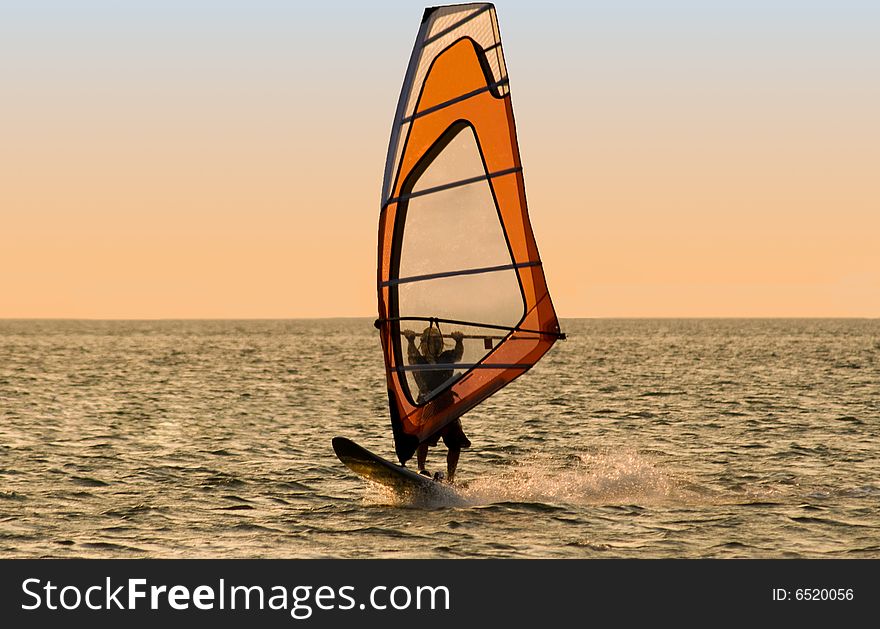 Silhouette Of A Windsurfer