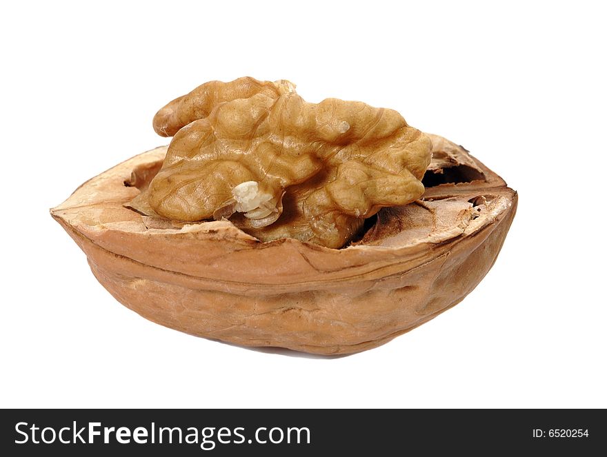 Delicious open walnut on white background