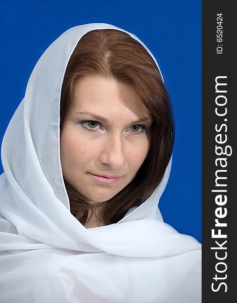 The Girl With A Scarf On A Dark Blue Background