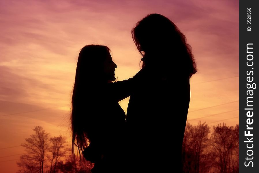 Romantic Couple At Sunset