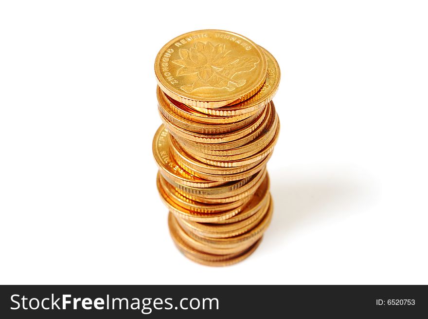 Pile of coins isolated on white background