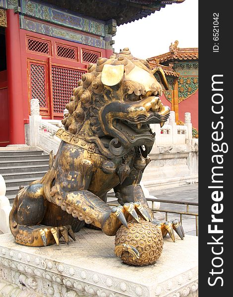 Ancient palace and copper lion. Ancient palace and copper lion