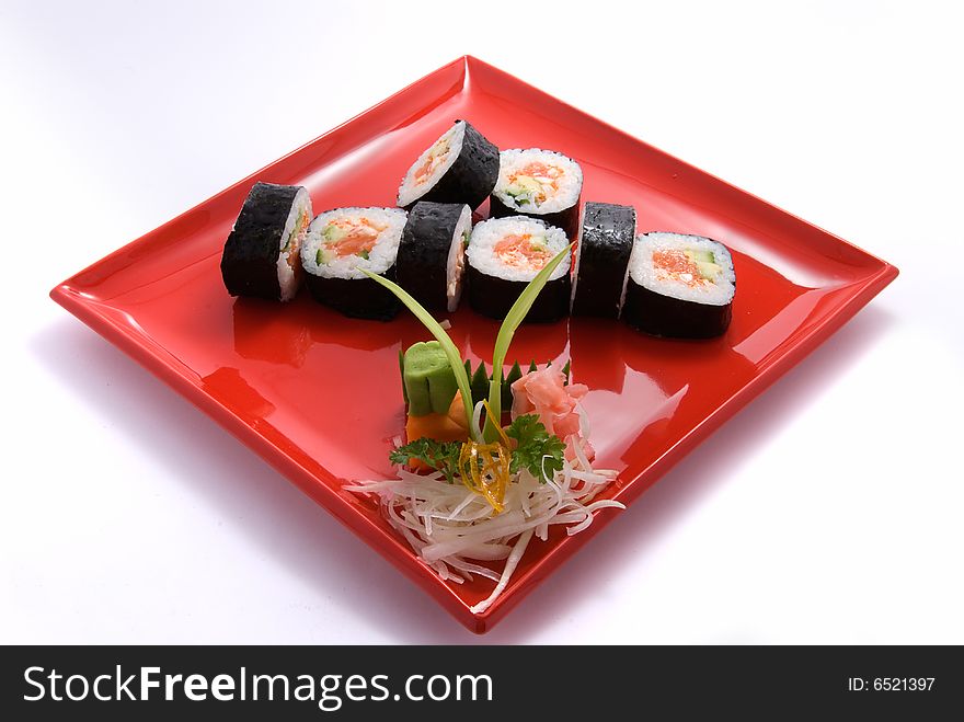 Rolls in red plate on white background. Rolls in red plate on white background