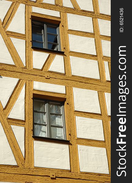 Two windows in old half-timbered house
