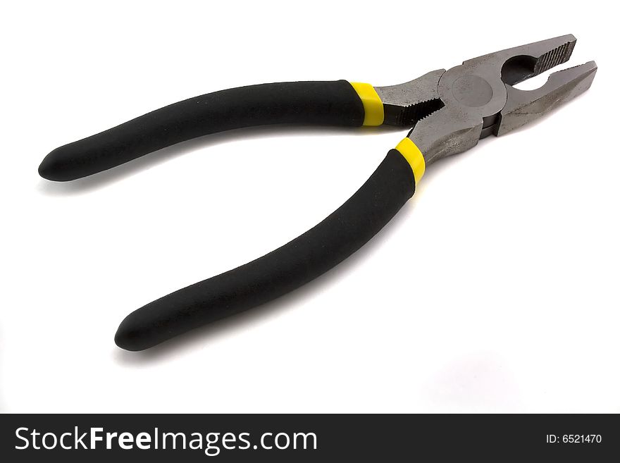 Black combination pliers on white background white background object isolated