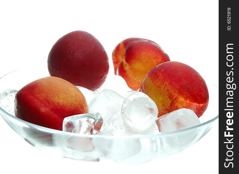 Peach in headland with ice on white background. Peach in headland with ice on white background