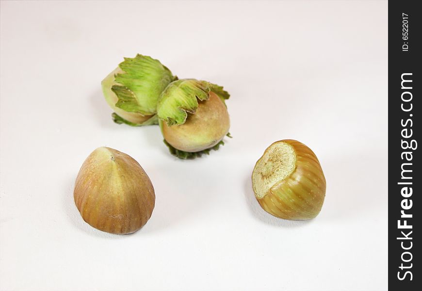 The hazelnuts - isolated on white