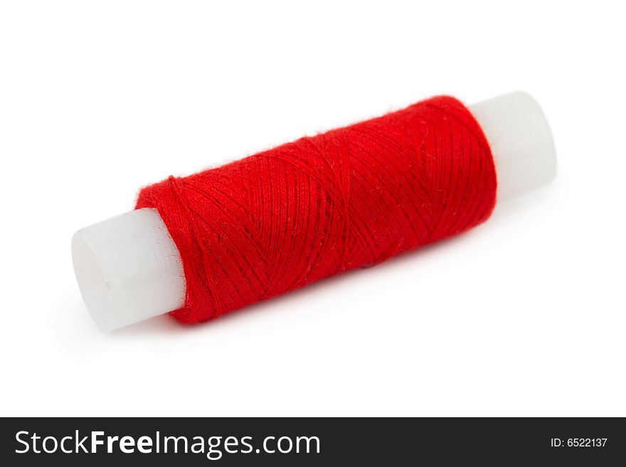 Spool of thread isolated on white background